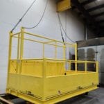 Custom Cantilever Manbasket with Overhead Structure. Corner view