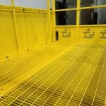 Custom Cantilever Manbasket with Overhead Structure. Inside view