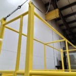 Custom Cantilever Manbasket with Overhead Structure. Overhead structure