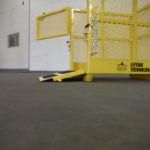Custom Single Pick Material Basket. Side view, open gate and ramp