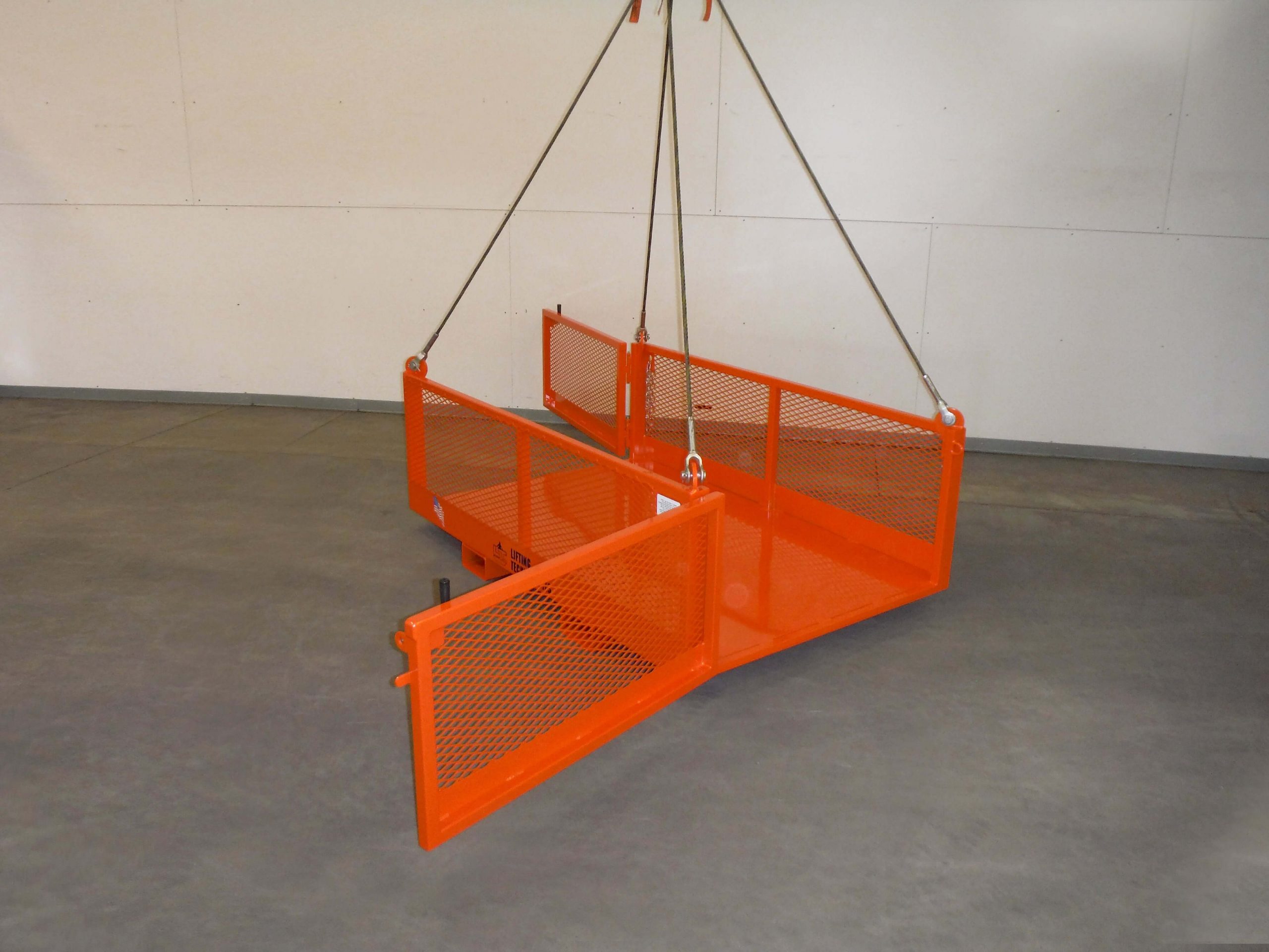 Material-handling platform with sling and fork pockets. Side view, open door