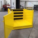 Forklift and Crane hoisting Material Basket. Back view, open door